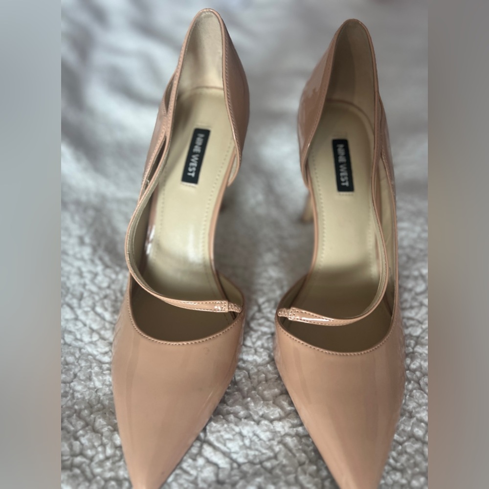 Pre-owned Nine West heels.  Size 10. Only wore it twice. Perfect condition